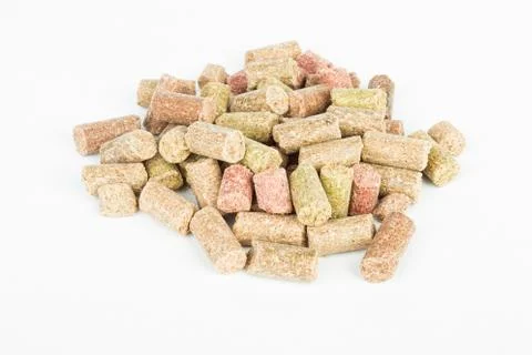 Dry feed for fish. Stock Photos