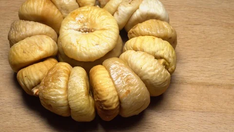 Dry figs. Close-up. Pile of dried fruits in rotation. Stock Footage 99559047