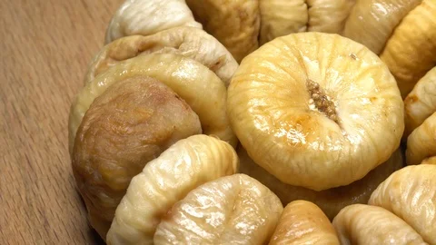 Dry figs. Close-up. Pile of dried fruits in rotation. 動画素材 99559231