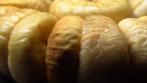 Dry figs in rotation on black background. Stock Footage 99558572