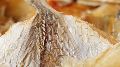 Dry fish snack for beer and drinks yellowstripe scad close-up. The yellowstripe Stock Footage 276229404