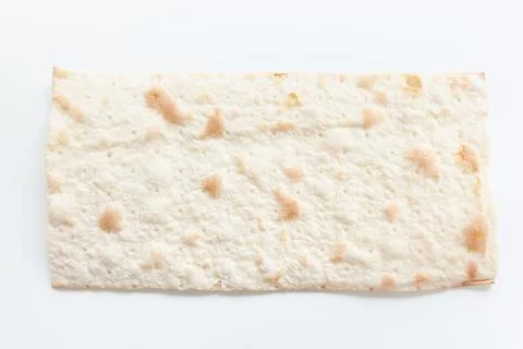 Dry flat bread, toasted, laying flat on white background Stock Photos