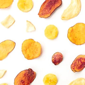 Dry fruit and vegetable chips, healthy vegan snack, an organic food flat lay 写真素材