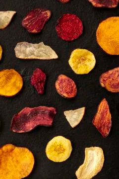 Dry fruit and vegetable chips, shot from above Stock Photos