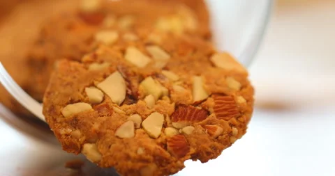 Dry fruit cookies on a table Stock Footage 329623805