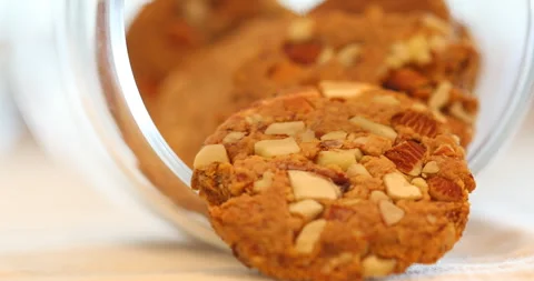 Dry fruits Biscuits on a table Stock Footage 329623890