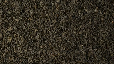 Dry green tea leaves background texture Stock Footage 340526224