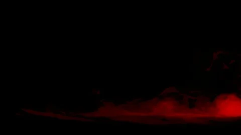 Dry Ice Red, dry ice smoke gently swirling over what appears to be a hillside Stock Footage 75496301