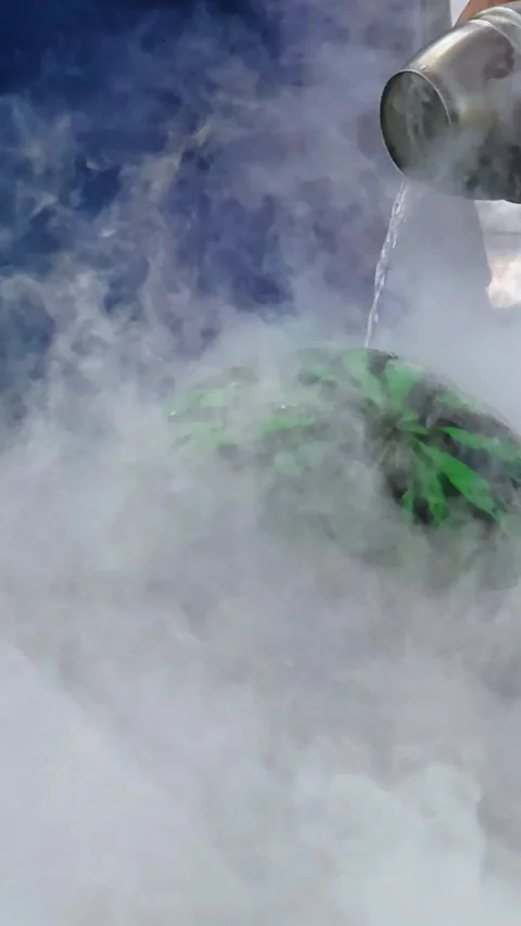 Dry ice sublimation creating thick white smoke in scientific experiment. Video stock 331494454