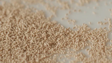 Dry instant yeast rotating turning round extreme macro Stock Footage 127714545