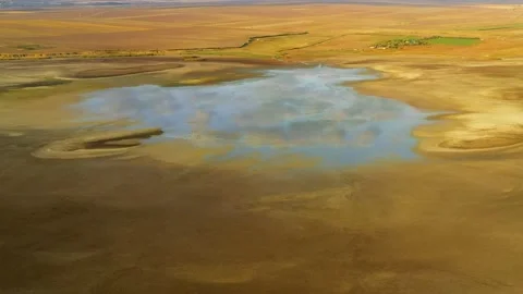 Dry lake or swamp in the process of drought  - aerial drone view Stock Footage 139794332