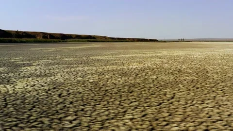 Dry lake or swamp in the process of drought  - aerial drone view Stock Footage 143570686
