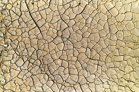 Dry land textured surface background, full frame shot Stock Photos