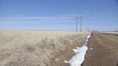 Dry landscape along desolate dirt road Stock Footage 104894353