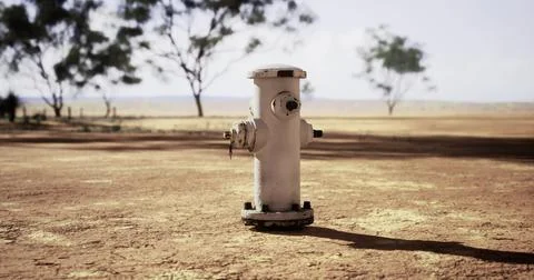 Dry landscape with fire hydrant standing alone under clear sky Stock Illustration