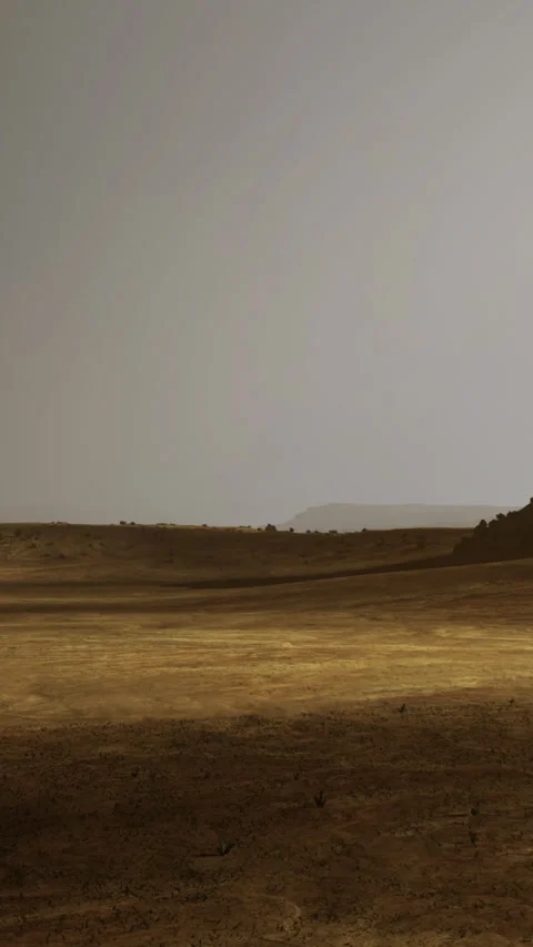 Dry landscape showing empty plains and distant hills under gray sky Stock Footage 331765920