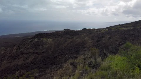 Dry lava flow down to Ocean's edge,Big Island,Hawaii,USA Stock Footage 119586169