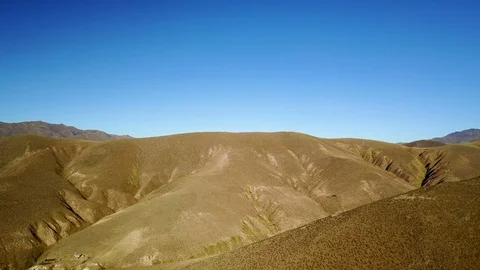 Dry mountain and blue sky, desert mountains aerial shot Stock Footage 88563714