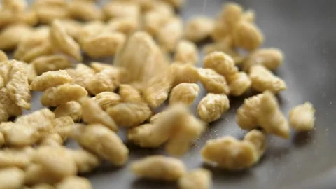 Dry oat flakes falling into gray craft kitchen bowl Vidéo 286099477