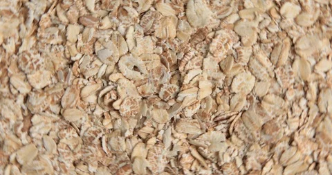 Dry oat flakes grains background Stock Footage 95968770
