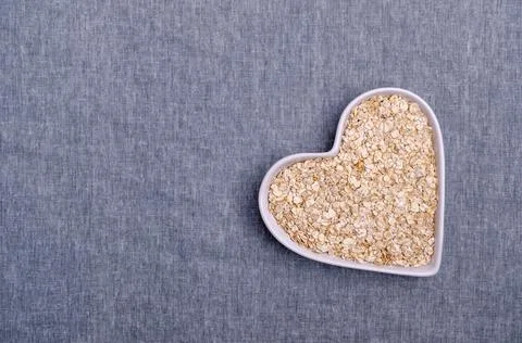 Dry oat flakes Stock Photos