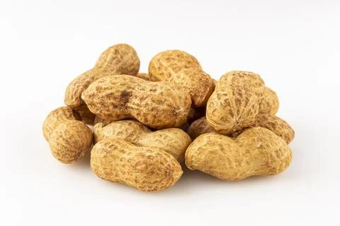 Dry peanut on the white background. Stock Photos