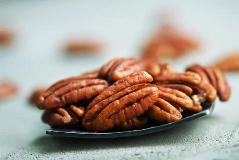 Dry pecan on the table Stock Photos