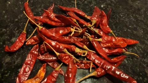 Dry red chilies in kitchen closeup moving video Video stock 152305295
