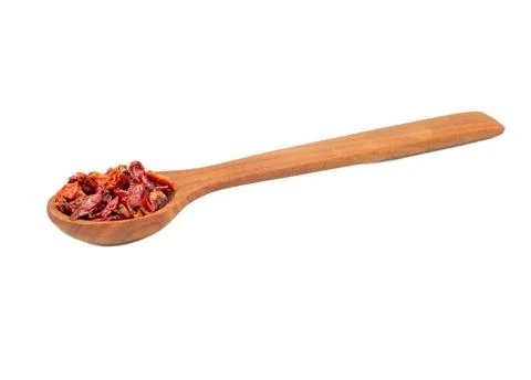 Dry red pepper in spoon Stock Photos