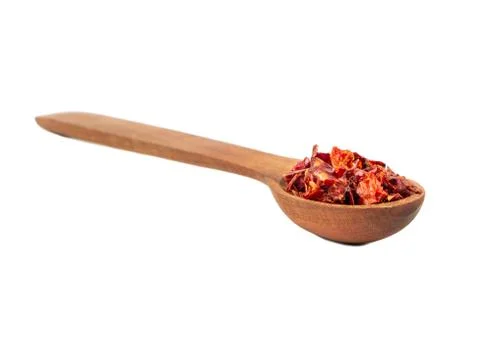 Dry red pepper in spoon Stock Photos
