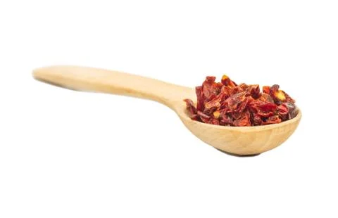 Dry red pepper in spoon Stock Photos