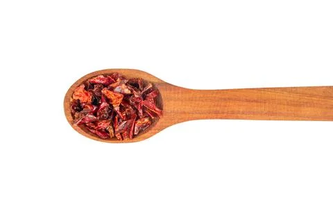 Dry red pepper in spoon Stock Photos