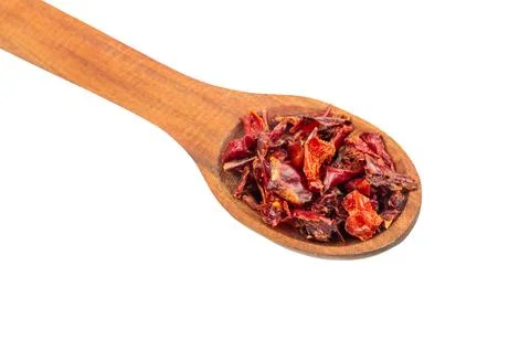 Dry red pepper in spoon Stock Photos