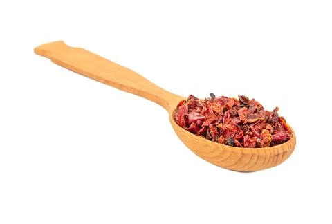 Dry red pepper in spoon Stock Photos