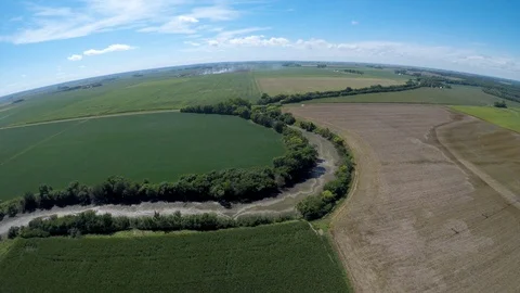 Dry River Bed Bending around Farmland in Midwest America - South Dakota Stock Footage 116126794
