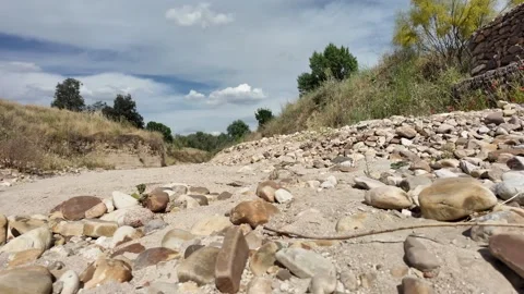 Dry river bed during heavy summer drought in France. Stock Footage 337985829