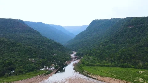 Dry river go through border hills Stock Footage 346886903