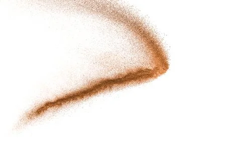 Dry river sand explosion. Brown color sand splash against white background. Stock Photos
