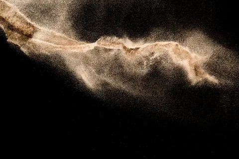 Dry river sand explosion. Golden colored sand splash agianst dark background. Stock Illustration
