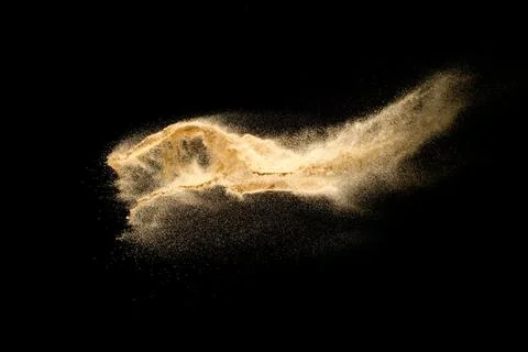 Dry river sand explosion isolated on black background. Abstract sand cloud... イラスト素材
