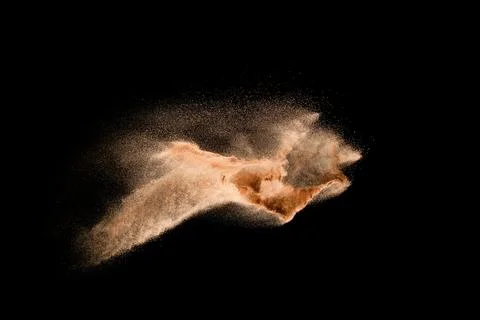 Dry river sand explosion isolated on black background. Abstract sand cloud... Stock Photos