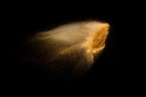 Dry river sand explosion isolated on black background. Abstract sand cloud... Stock Photos