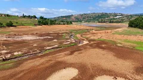 Dry Riverbed in Drought-Stricken Landscape Video stock 296542297