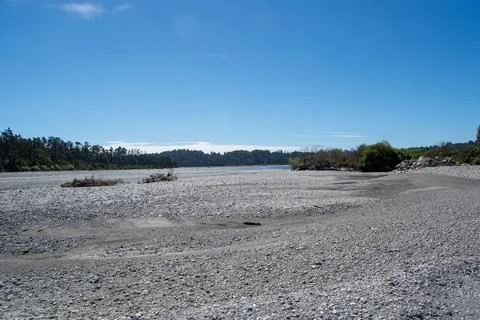 Dry Riverbed Under Clear Blue Sky Stock Photos