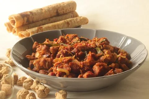 Dry roasted soya chunks with onions tomatoes and spices. Prepared with Kerala Stock-Fotos