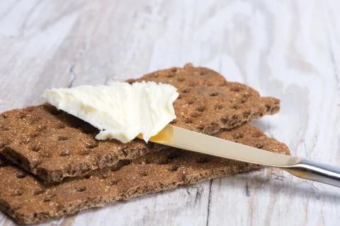 Dry rye crisp bread and butter Stock Photos