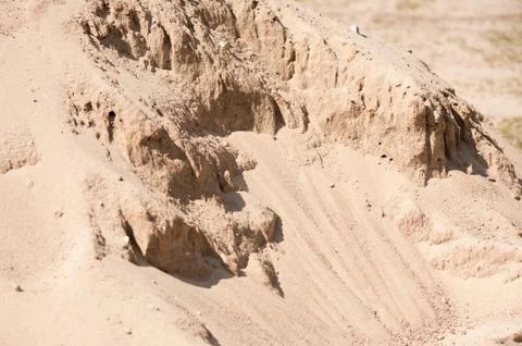 Dry sand heap fall down abstract Stock Photos