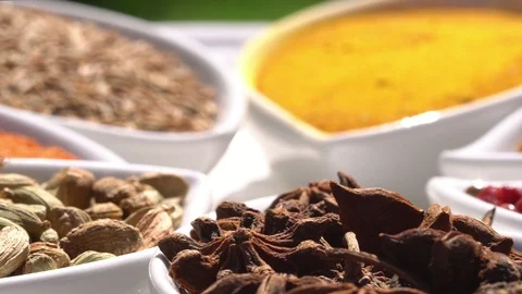 Dry spices on a rotary table. 4K. Macroshooting. Stock Footage 93798896