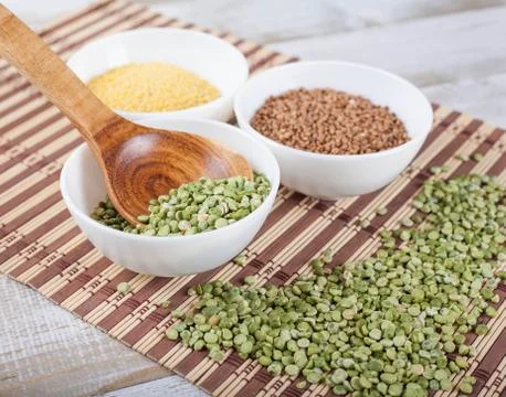 Dry split green peas Stock Photos