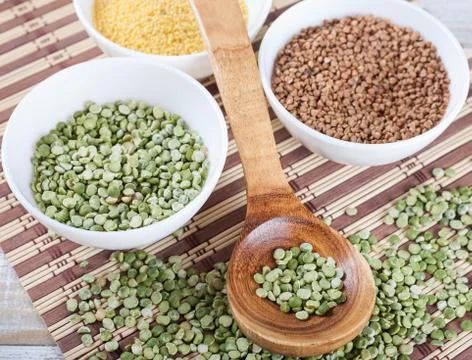 Dry split green peas Stock Photos